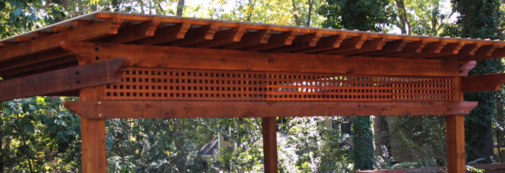 Handcrafted cedar pergola outdoor living area — Southern Outdoor Structures